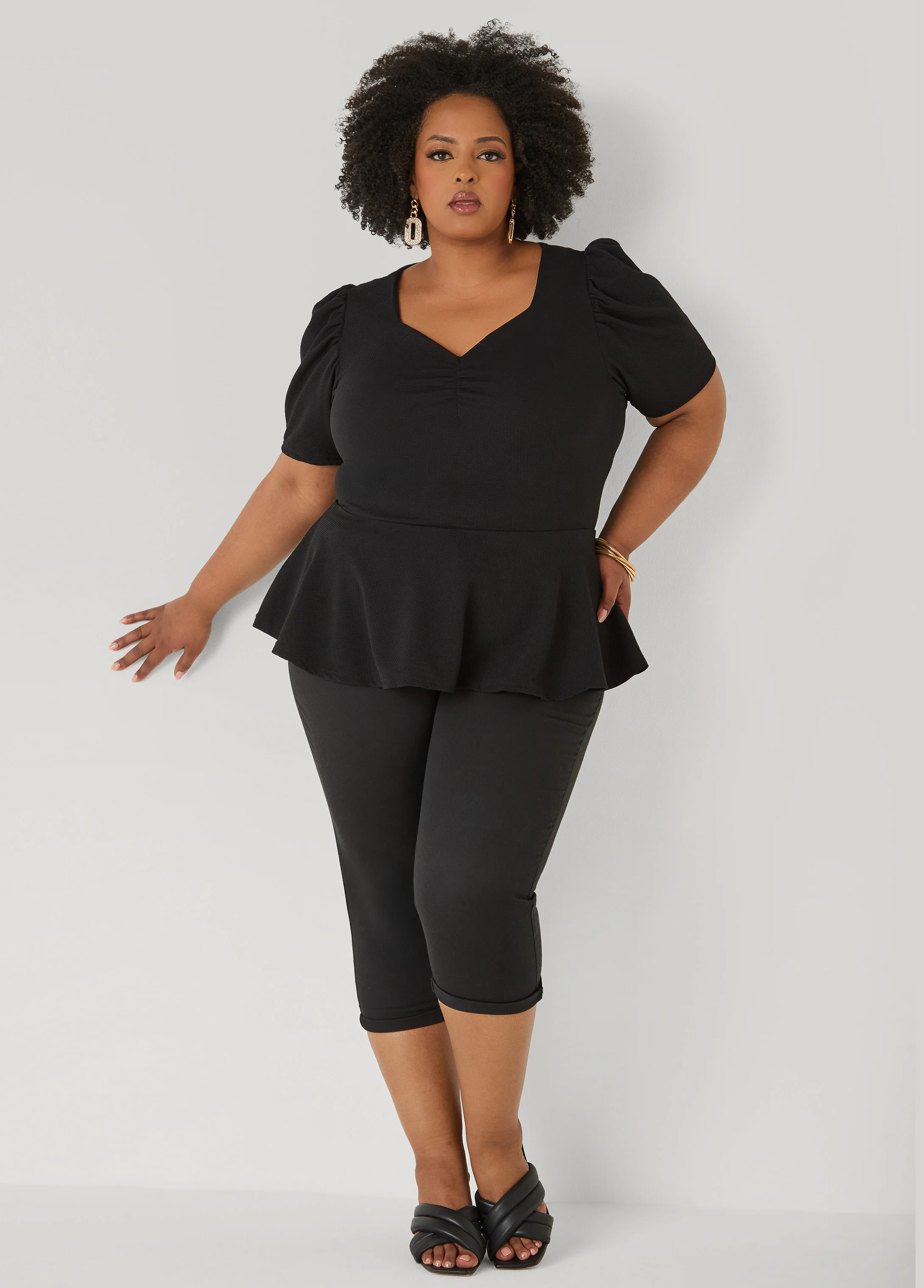 Puff Sleeved Textured Peplum Top - Image 11