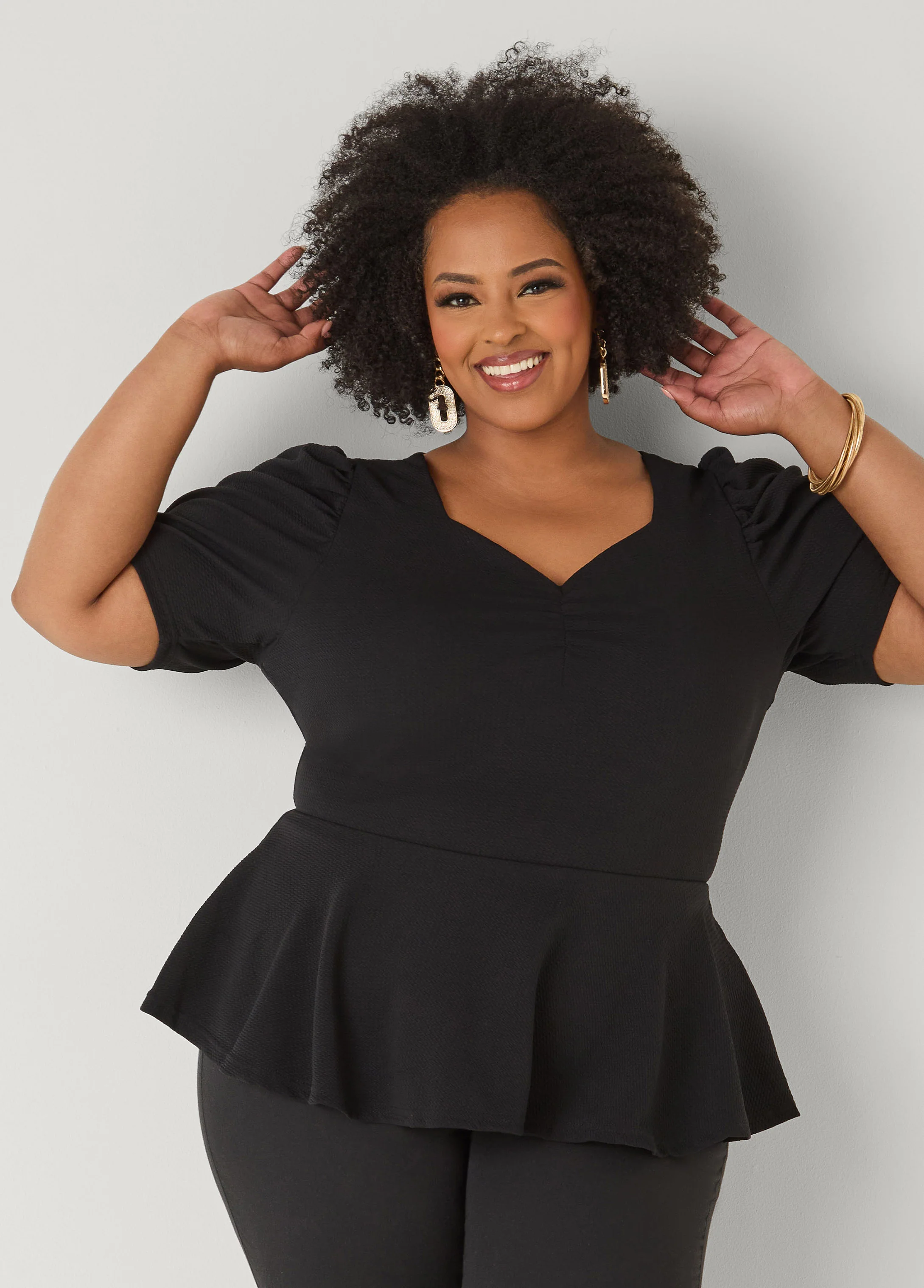 Puff Sleeved Textured Peplum Top - Image 12