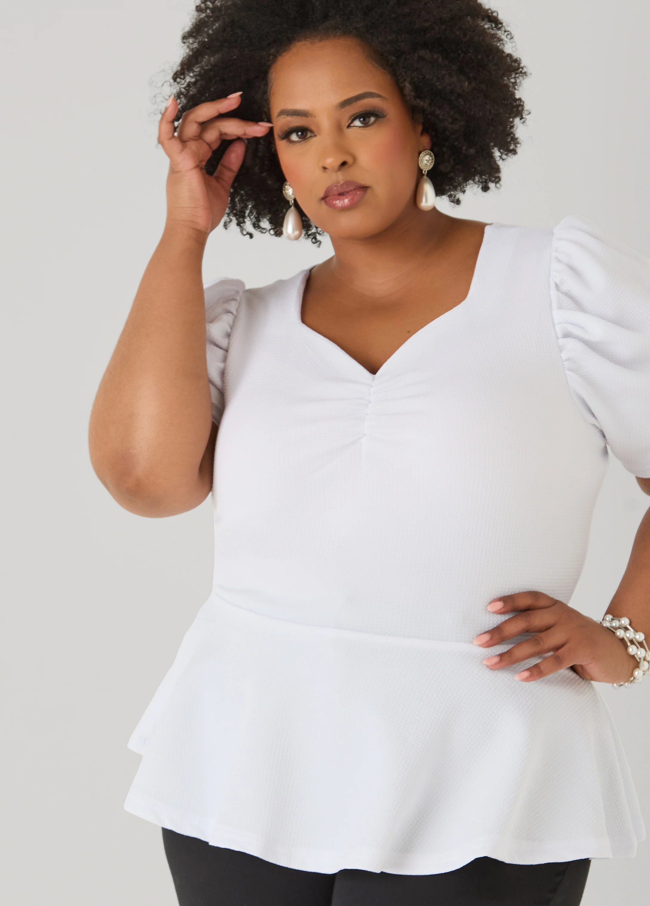 Puff Sleeved Textured Peplum Top - Image 8