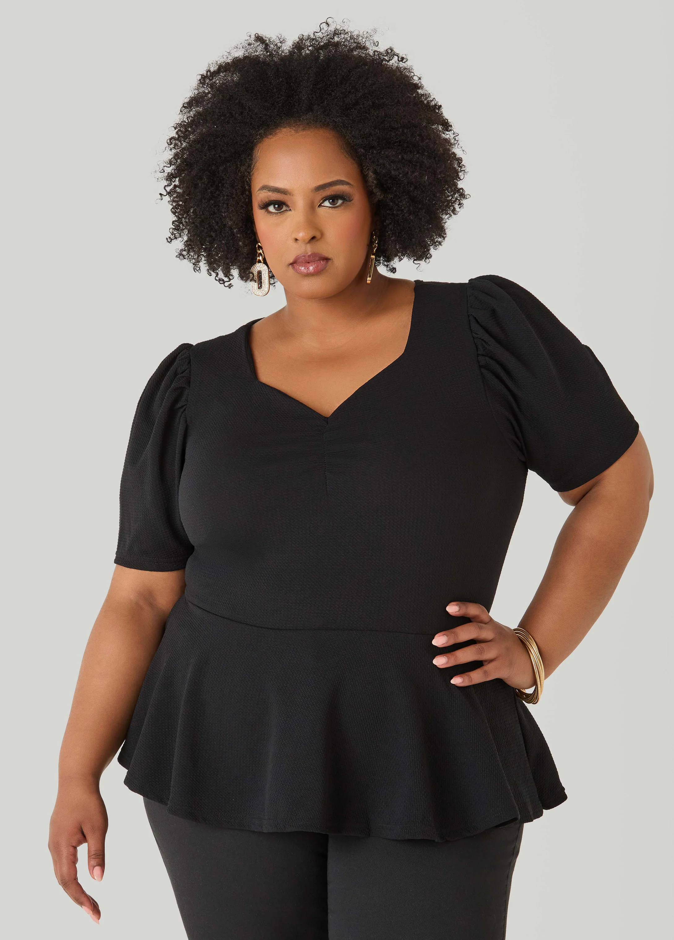 Puff Sleeved Textured Peplum Top - Image 9